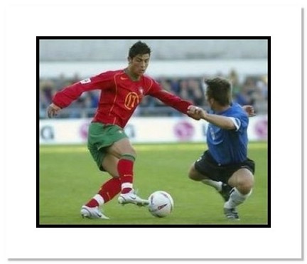 Cristiano Ronaldo (Portugal) "Dribbling at World Cup" Double Matted 8" x 10" Photograph