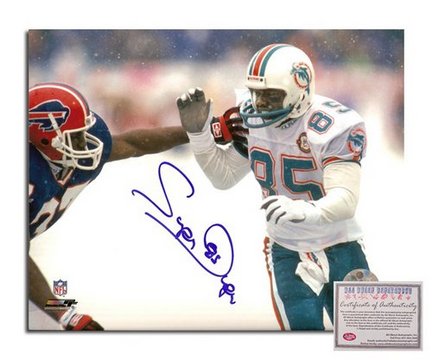 Mark Duper Miami Dolphins Autographed 8" x 10" Snow Game Photograph with "85" Inscription (Unframed)