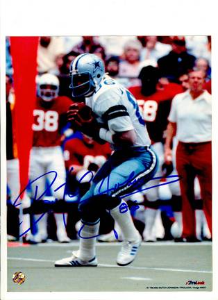 Butch Johnson Dallas Cowboys Autographed 8" x 10" White Jersey Photograph with "86" Inscription (Unf