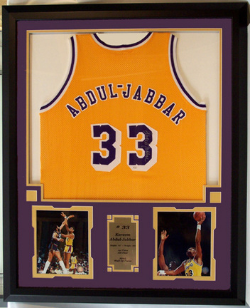 Kareem Abdul Jabbar Photo Collage with Autographed Los Angeles Lakers Road Basketball Jersey in a Deluxe Frame
