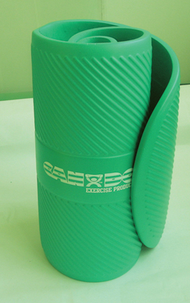 Cando 24" x 72" x 0.6" Closed Cell Foam Exercise Mat - Green