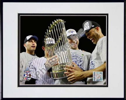 Andy Pettitte, Jorge Posada, Derek Jeter, & Mariano Rivera with the World Series Trophy Game Six of the 2009 MLB Wor