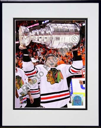 Patrick Kane with the 2009 - 2010 Stanley Cup (#27) Double Matted 8” x 10” Photograph in Black Anodized Aluminum Fra