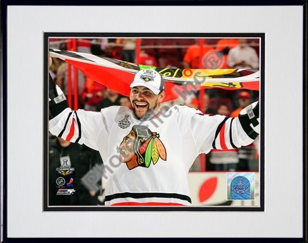 Dustin Byfuglien with Chicago Blackhawks Flag 2010 Stanley Cup Finals (#35) Double Matted 8” x 10” Photograph in Bla