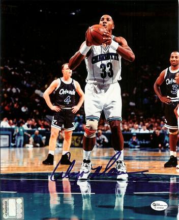 Alonzo Mourning Autographed Charlotte Hornets "With Ball" 8" x 10" Photograph (Unframed)