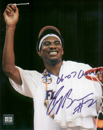 Corey Brewer Autographed "Net" 8" x 10" Photograph with "06-07 Champs" Inscription (Unfram