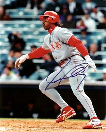 Juan Gonzalez "Running" Autographed Texas Rangers 8" x 10" Photograph (Unframed)