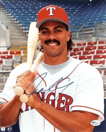 Juan Gonzalez "Posing" Autographed Texas Rangers 8" x 10" Photograph (Unframed)