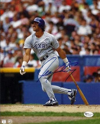 Juan Gonzalez "Action" Autographed Texas Rangers 8" x 10" Photograph (Unframed)