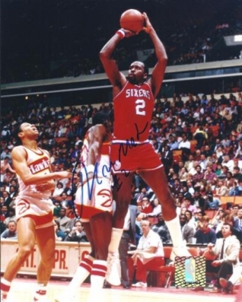 Moses Malone "Shooting" Autographed Philadelphia 76ers 8" x 10" Photograph (Unframed)