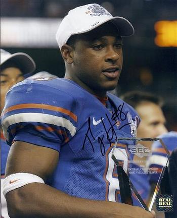 Percy Harvin Autographed Florida Gators 8" x 10" Photograph with Trophy (Unframed)