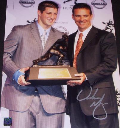 Urban Meyer Autographed Florida Gators 11x14 Heisman Photograph with Tim Tebow (Unframed)