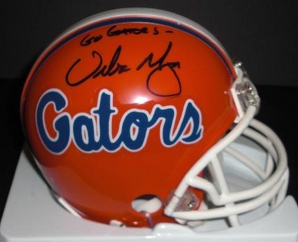Urban Meyer Autographed Florida Gators Mini Helmet with "06 NATL CHAMPS" inscription