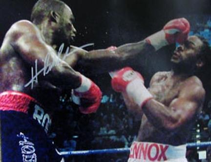 Hasim Rahman Autographed "Punching Lennox Lewis" 16" x 20" Photograph (Unframed)