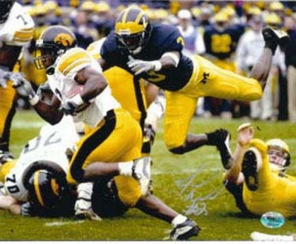 Fred Russell Autographed 8" x 10" vs. Michigan Wolverines Photograph (Unframed)
